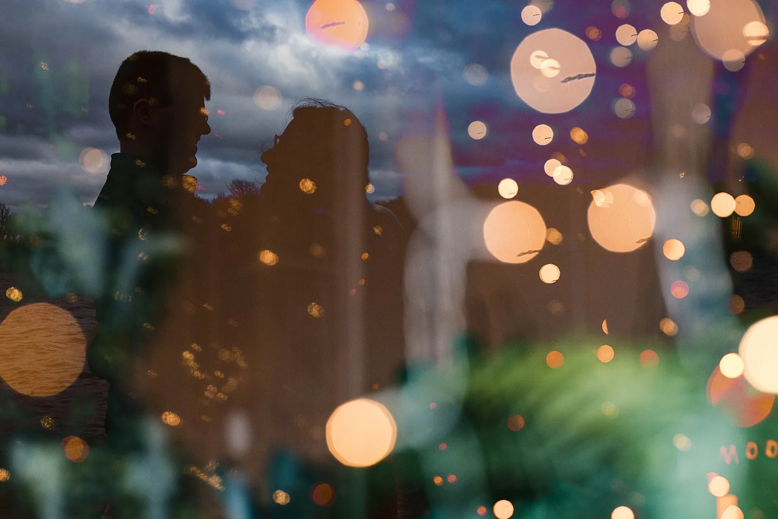  Getting a little creative  Sometimes I do silly things like stand in an open entry way to a pizza shop so I can create a multiple exposure with their Christmas lights and trees! 